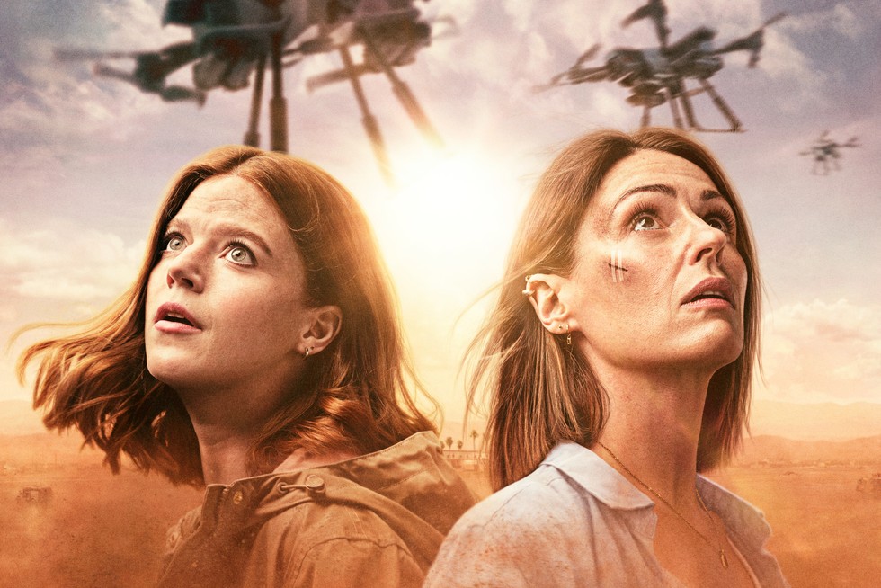 DI Kirsten Longacre (Rose Leslie) and DCI Amy Silva (Suranne Jones) in Vigil looking up at drones