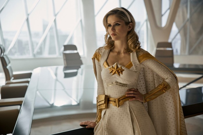 Erin Moriarty in The Boys season 4 wearing a white and gold dress